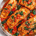 Fish Recipes to Try: Grilled Salmon with Herbs and Roasted Cod with Tomatoes